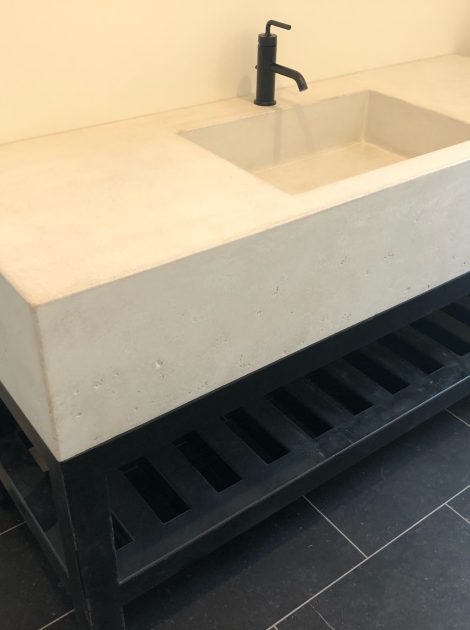 https://acsconcrete.com/wp-content/uploads/2024/06/floating-parchment-sink-RB-Homes-scaled.jpg