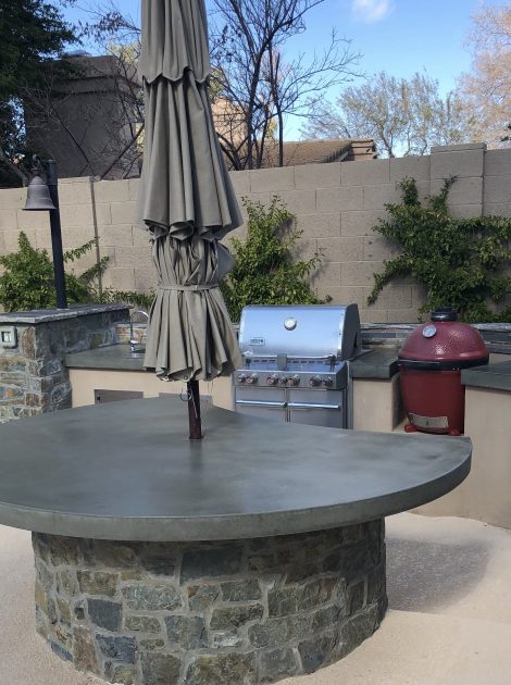https://acsconcrete.com/wp-content/uploads/2024/06/outdoor-table-w-smile-scaled.jpg